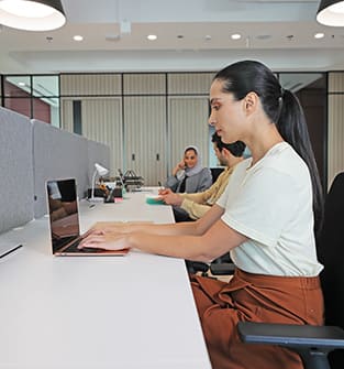 Entrepreneur finishing tasks at dquarters workspace open offices